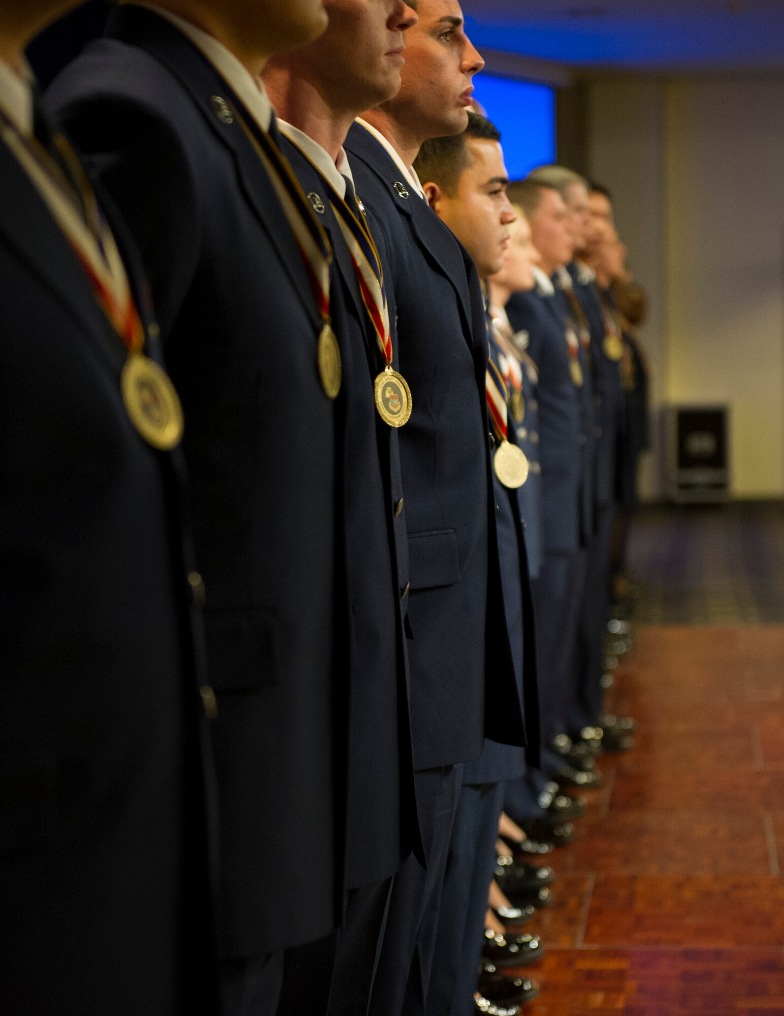 YOKOTA AIR BASE, Japan -- Airman Leadership School Class 12-G graduates align themselves in preparation for singing the Air Force Song at the conclusion of their graduation ceremony at Yokota Air Base, Japan, Oct. 18, 2012. (U.S. Air Force photo by Senior Airman Andrea Salazar)