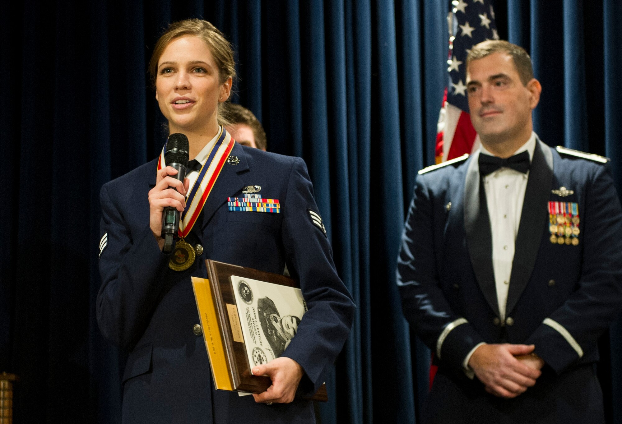 YOKOTA AIR BASE, Japan -- Senior Airman Whitney Byers, 730th Air Mobility Squadron, gives a speech after receiving the John L. Levitow Award during the Airman Leadership School Class 12-G graduation ceremony at Yokota Air Base, Japan, Oct. 18, 2011. The Levitow Award is the highest honor awarded during Air Force professional military education. (U.S. Air Force photo by Senior Airman Andrea Salazar)