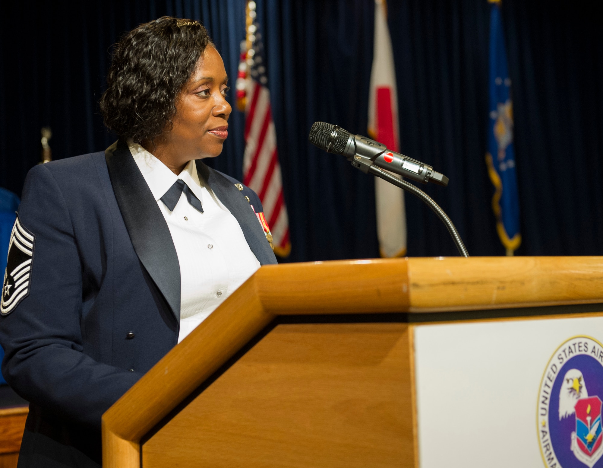 YOKOTA AIR BASE, Japan -- Chief Master Sgt. Sonya Mayo, 374th Force Support Squadron superintendent, speaks during the Airman Leadership School graduation at Yokota Air Base, Japan, Oct. 18, 2012. Mayo was the guest speaker for the event and talked about the professional qualities and high expectations of class 12-G.  (U.S. Air Force photo by Senior Airman Andrea Salazar)