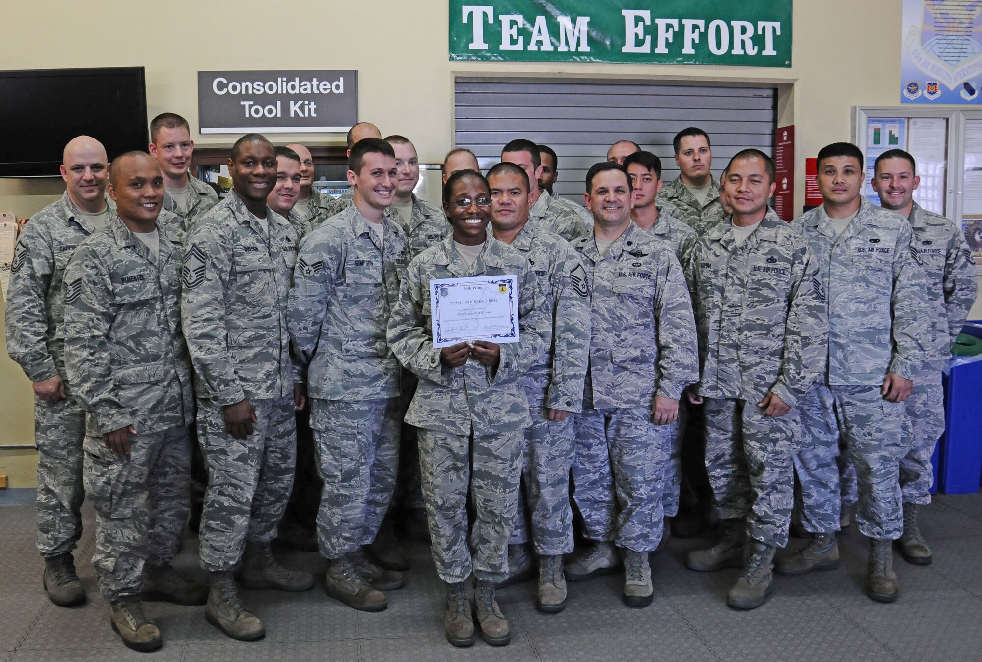 ANDERSEN AIR FORCE BASE, Guam-- Staff Sgt. Alexandria Jones, 734th Air Mobility Squadron aircraft electrical and environmental system specialist, was awarded Team Andersen’s Best here Oct.18. Team Andersen's Best is a recognition program which highlights a top performer from the 36th Wing. Each week, supervisors nominate a member of their team for outstanding performance and the wing commander presents the selected Airman/civilian with an award. To nominate your Airman/civilian for Team Andersen's Best, contact your unit chief or superintendent explaining their accomplishments. (U.S. Air Force photo by Airman 1st Class Mariah Haddenham/Released)