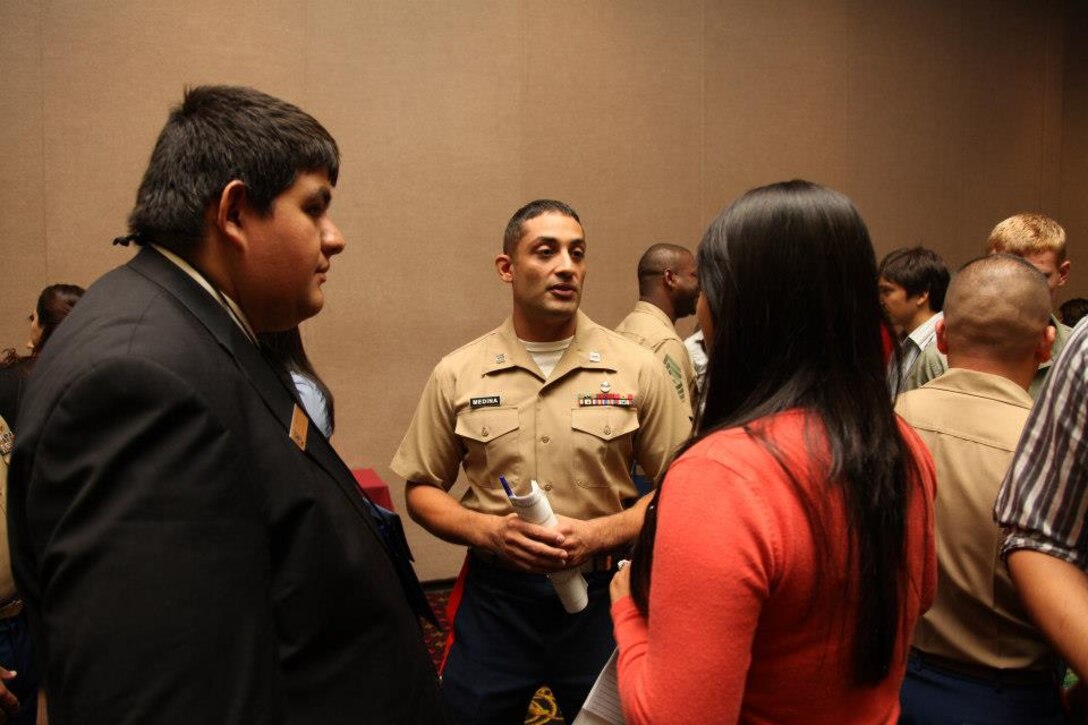 LAS VEGAS – Captain Albert N. Medina, officer selection officer, Recruiting Station Los Angeles, speaks to students during the 2012 MAES: Latinos in Science and Engineering Symposium at the Riviera Hotel & Casino, Oct. 12. In addition to educating students on missions of and opportunities in the Marine Corps, Medina provided an ethics workshop. (US Marine Corps photo by Sgt. James A. Hall)