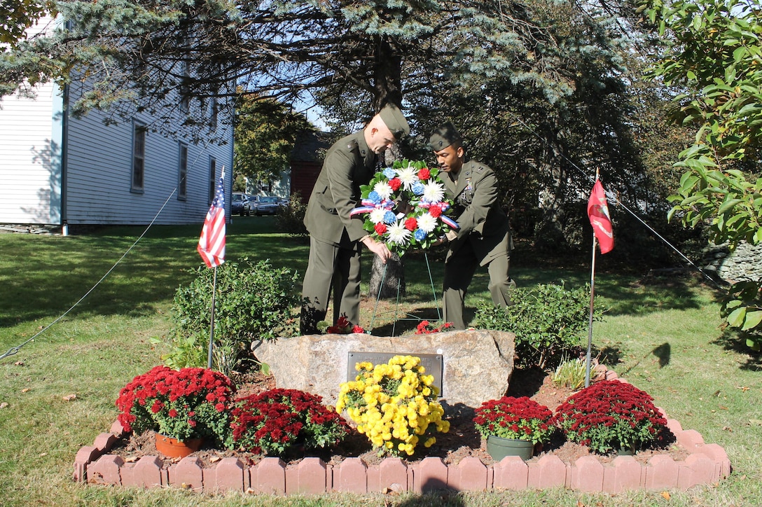 Lt. Col William Wando, a student at the Naval War College, and Capt. Cavan Croskey, Aviation Logistics Tactical Information Officer in Charge at the Aviation Logistics School, Marine Corps Detachment Newport, Naval Station Newport, place the wreath behind the Portmsouth Beirut Memorial in Portsmouth, R.I. following a ceremony held this morning at the site.  The memorial specifically honors the 9 Rhode Island Marines who died 29 years ago today in the bombing.