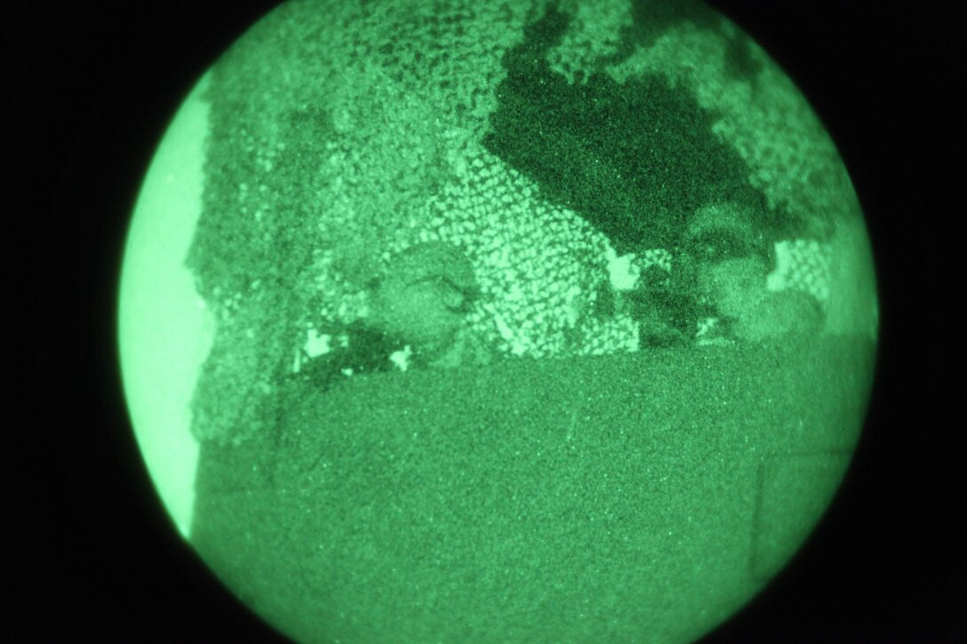 Marines with Combat Logistics Battalion 11, Combat Logistics Regiment 17, 1st Marine Logistics Group, stand watch from a guard tower during a training exercise at Camp Pendleton, Calif., Oct. 18. During the Basic Combat Skills Course, the Marines spend a week in the field learning new skills and refreshing old ones to increase the unit's combat readiness.