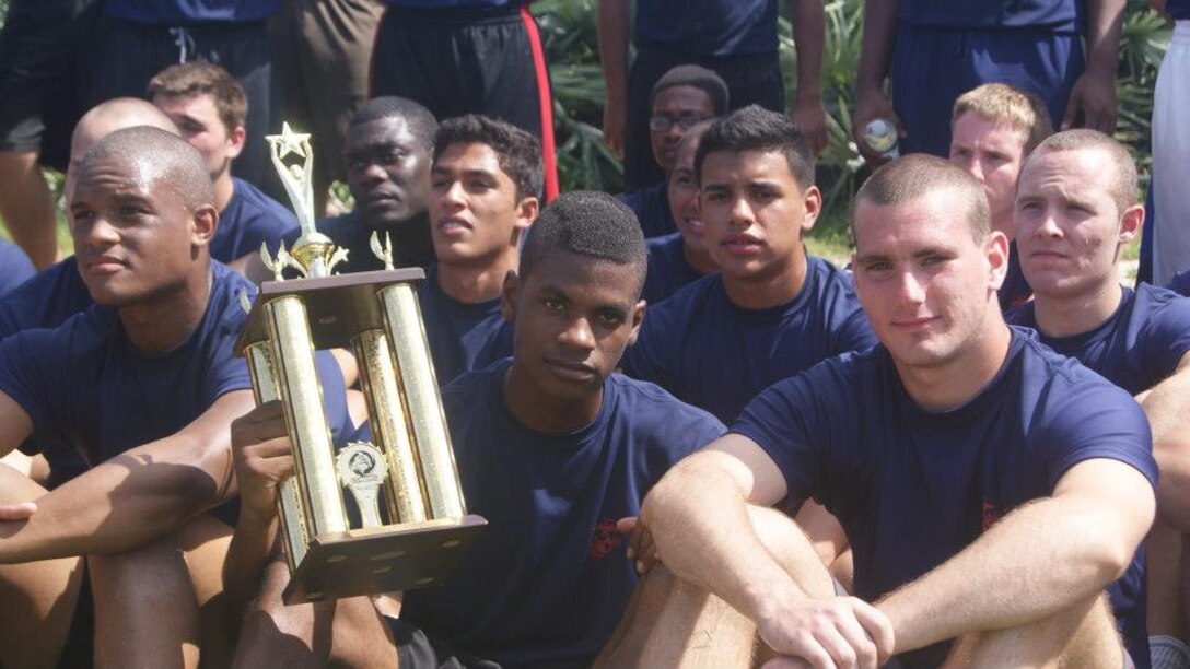 Recruiting Station Orlando poolees pose during a Oct. 13, field meet between multiple RS Orlando Recruiting Sub Stations in Melbourne Beach, Fla.   