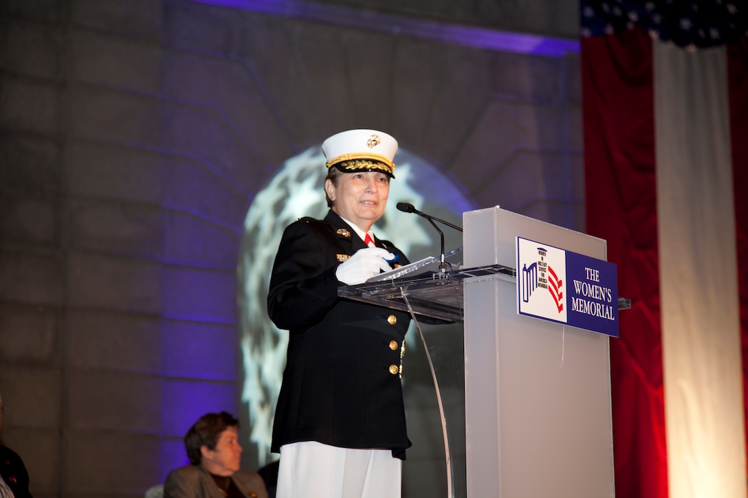 Maj. Gen. Angela Salinas, director of Manpower Management Division, Manpower and Reserve Affairs, gives the keynote address at the Women In Military Service For America Memorial at Arlington National Cemetery Oct. 20, 2012, during a Service of Remembrance that highlighted the152 service women killed in the Global War on Terrorism.