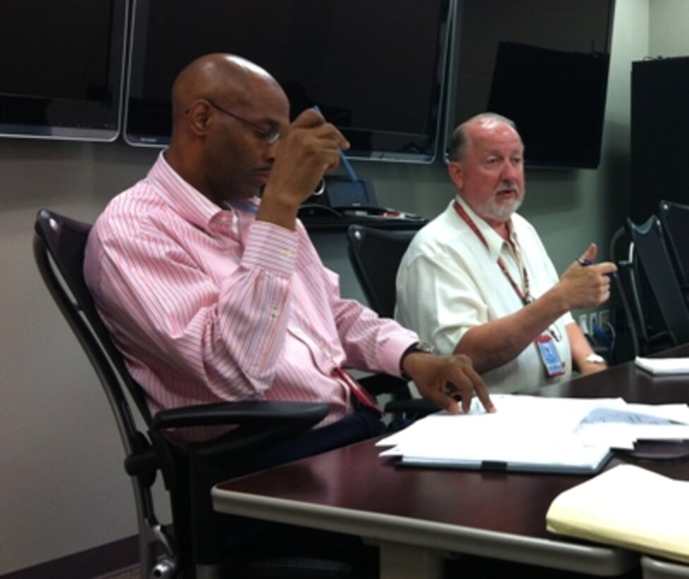 ORLANDO, Fla. -Rand Stiles (right) attends a Marine Corps Systems Command Training Systems Program Management Office meeting in Orlando, Fla., with Terence Connors.