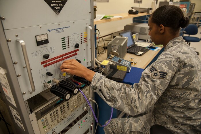 Staff Sgt. Christopher Hutchison, 437th Maintenance Squadron Precision Measurement Equipment Laboratory section supervisor for the K-3 microwave measurement section, looks at a circuit card at the Electrostatic discharge/Sautering station Oct. 16, 2012 at Joint Base Charleston - Air Base, S.C. The ESD/Sautering troubleshoots down to the component level on a circuit card. (U.S. Air Force photo/Airman 1st Class Ashlee Galloway)