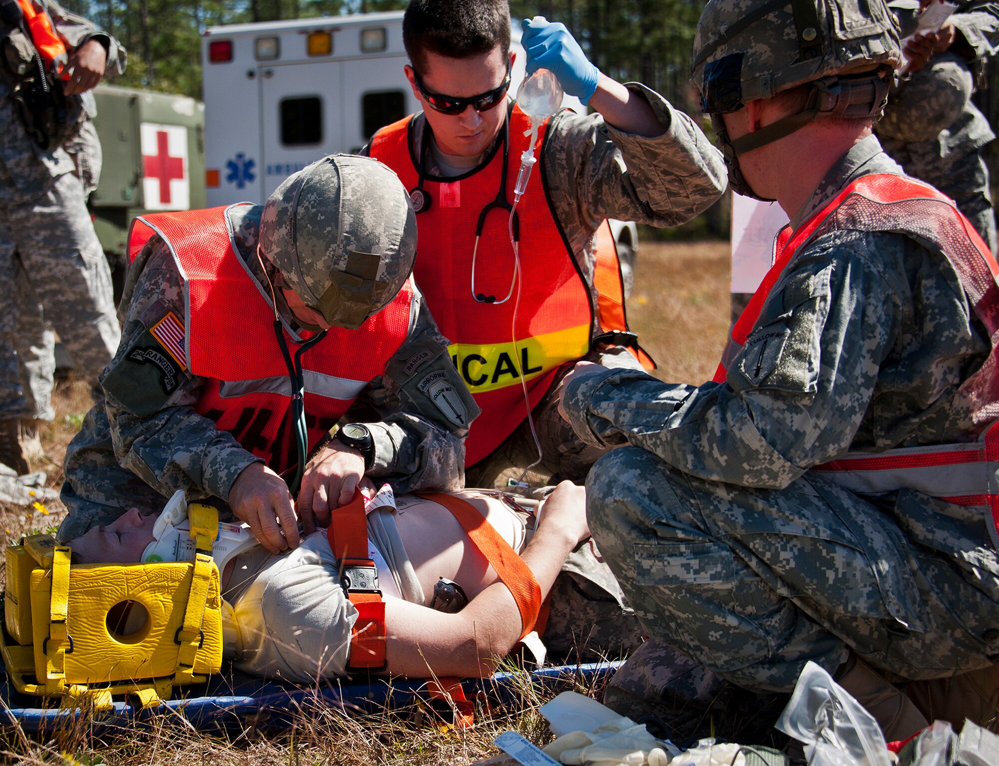 Army and Air Force medics attend to a simulated victim during a downed aircraft exercise on the Eglin range, Oct. 20.  The 6th Ranger Training Battalion, Team Eglin’s emergency responders and local medical facilities participated in the exercise that simulated a helicopter crash with 12 Soldiers injured deep within the Eglin range.  The victims were either evacuated by helicopter or by ambulance to area hospitals.  The annual exercise was to validate the battalion’s emergency procedures and test their communication with Team Eglin and local emergency and medical units.  (U.S. Air Force photo/Samuel King Jr.)