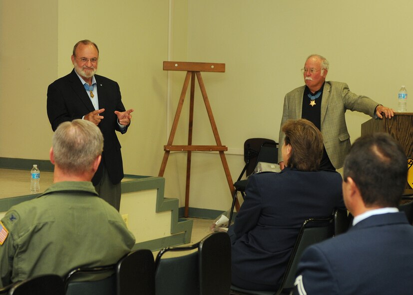 Two Medal of Honor recipients, Marine Col. Harvey C. Barnum Jr. (right) and Army 1st Lt. Brian M. Thacker, answer questions from the audience of approximately 50 reservists at Dover Air Force Base, Del., Oct. 14, 2012. Barnum received his award from President Lyndon B. Johnson on Feb. 27, 1967, and Thacker received his award from President Richard Nixon on Oct. 15, 1973. (U.S. Air Force photo/Senior Airman Erika Brooke)