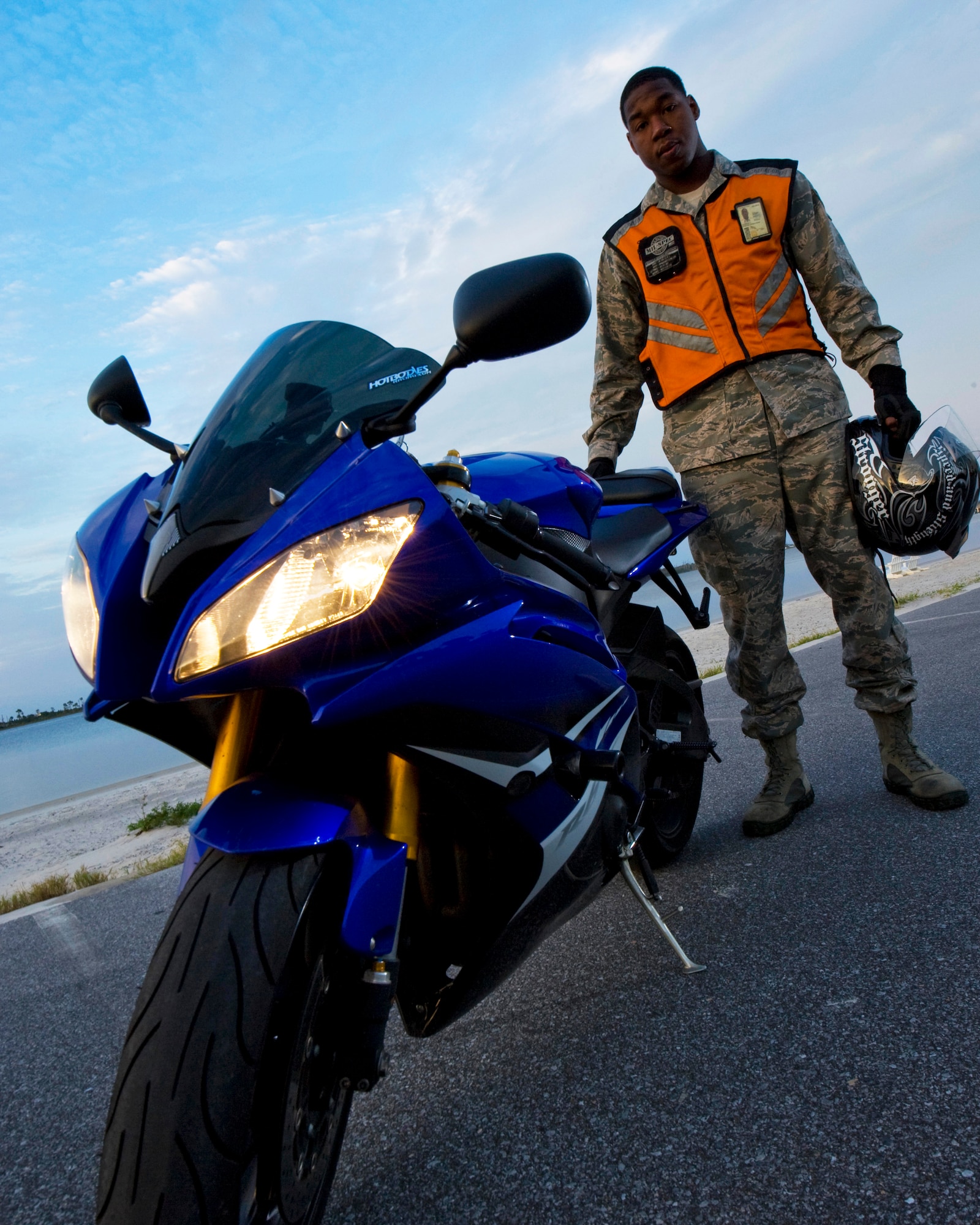 U.S. Air Force Staff Sgt. Dwayne Hopkins, an air transportation craftsman from the 1st Special Operations Logistics Readiness Squadron, stands next to his motorcycle on Hurlburt Field, Fla., Oct. 3, 2012. Hopkins? personal protective equipment prevented him from being seriously injured during a motorcycle accident and afforded him the opportunity to tell his story as a member of the Airman to Airman Safety Advisory Council. (U.S. Air Force Photo / Staff Sgt. John Bainter)

