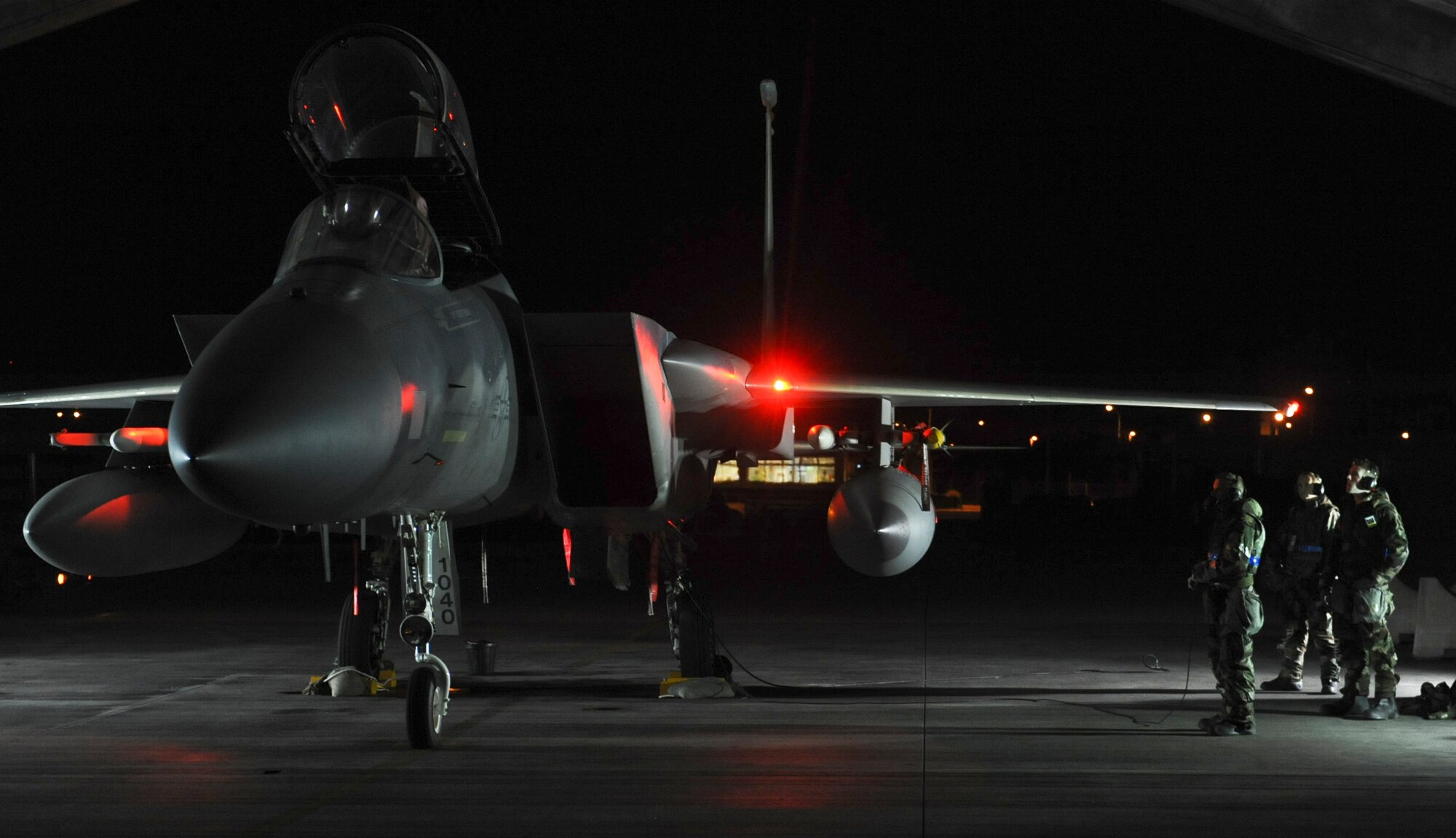 Kadena Airmen prepare to check an F-15C while being evaluated by Pacific Air Forces' Inspector General during Exercise Beverly Bearcat 12-1, an operational readiness inspection on Kadena Air Base, Japan, Oct. 25, 2012. The inspectors will evaluate the wing's ability to fulfill its commitments as required under the Japan-U.S security alliance. (U.S. Air Force photo/Airman 1st Class Justin Veazie)