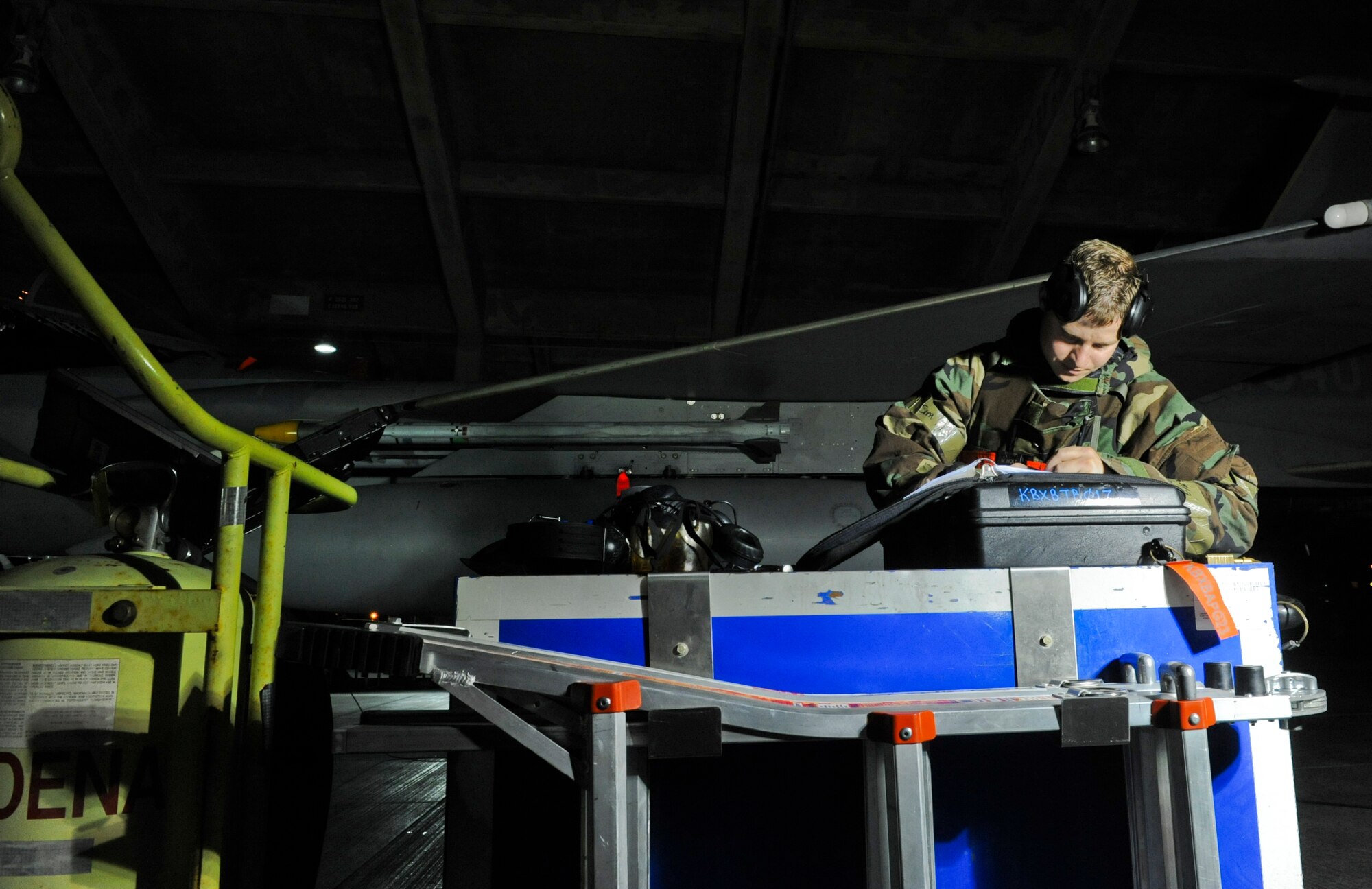 U.S. Air Force Senior Airman Michael Holt, 67th Aircraft Maintenance Unit electrical environmental technician, annotates the actions that are being completed during Exercise Beverly Bearcat 12-1, an operational readiness inspection on Kadena Air Base, Japan, Oct. 25, 2012. During the exercise, inspectors will evaluate the wing's overall level of readiness by examining mobilization procedures, aircraft generation and employment procedures, and the ability of Kadena's Airmen to operate in simulated crisis conditions. (U.S. Air Force photo/Airman 1st Class Justin Veazie)