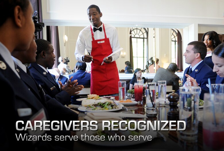 Jordan Crawford, Washington Wizards shooting guard, signs autographs and interacts with Airmen from the 79th Medical Wing, Joint Base Andrews, Md., during the 3rd Annual Salute to the Stars luncheon at the  in Washington, D.C., Oct. 22. (U.S. Air Force photo/ Staff Sgt. Nichelle Anderson)