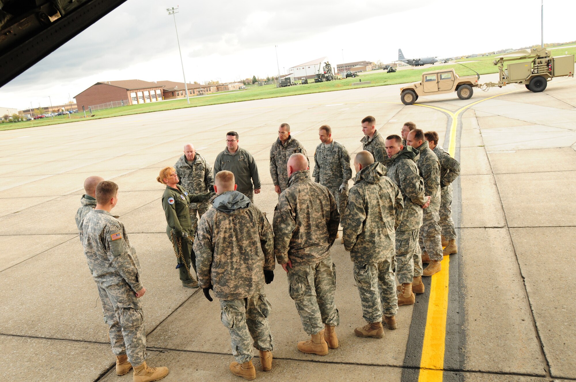 The operational company of the 42nd Infantry Division of the Army National Guard arrived ready to train with the 107th Airlift Wing's C-130 loadmasters. Senior Master Sgt. Santoro explains how the equipment will be loaded and secured on the C-130 aircraft. Oct. 20, 2012 (U.S. Air Force Photo/Senior Master Sgt. Ray Lloyd)
