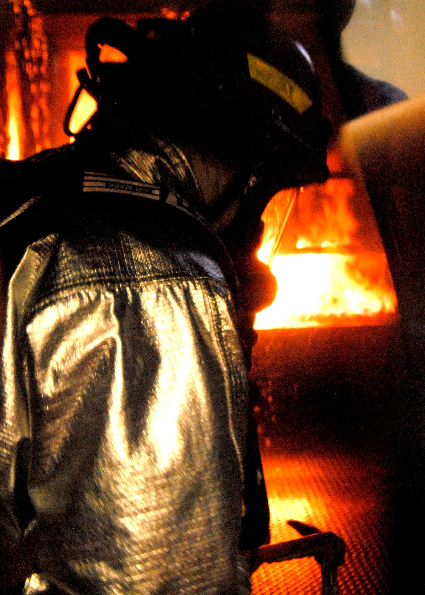 During the live fire training Oct.18, Edwards firefighters experienced temperatures in excess of 700 degrees Fahrenheit and practiced a variety of realistic scenarios. (Air Force Photo by Laura Mowry)