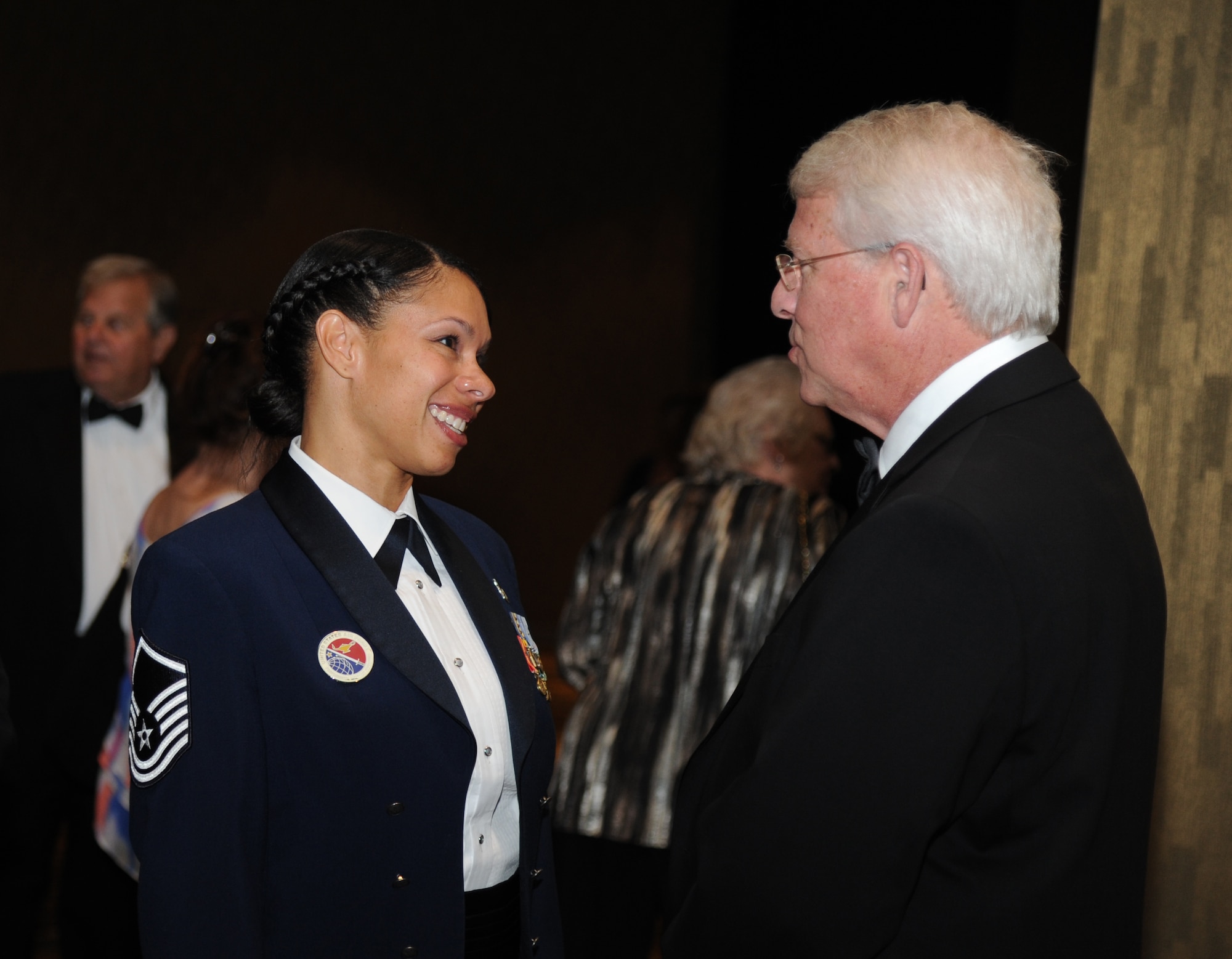 Master Sgt. Nicole Dismute, Mathies NCO Academy, Keesler Air Force Base, Miss., mingles with The Honorable Roger Wicker, United States Senate, during the reception at the 34th Annual Salute To The Military Oct. 23, 2012, at the Mississippi Coast Coliseum in Biloxi.  Dismute was recognized as the winner of the Thomas V. Fredian Community Leadership Award at the event.  (U.S. Air Force photo by Kemberly Groue)