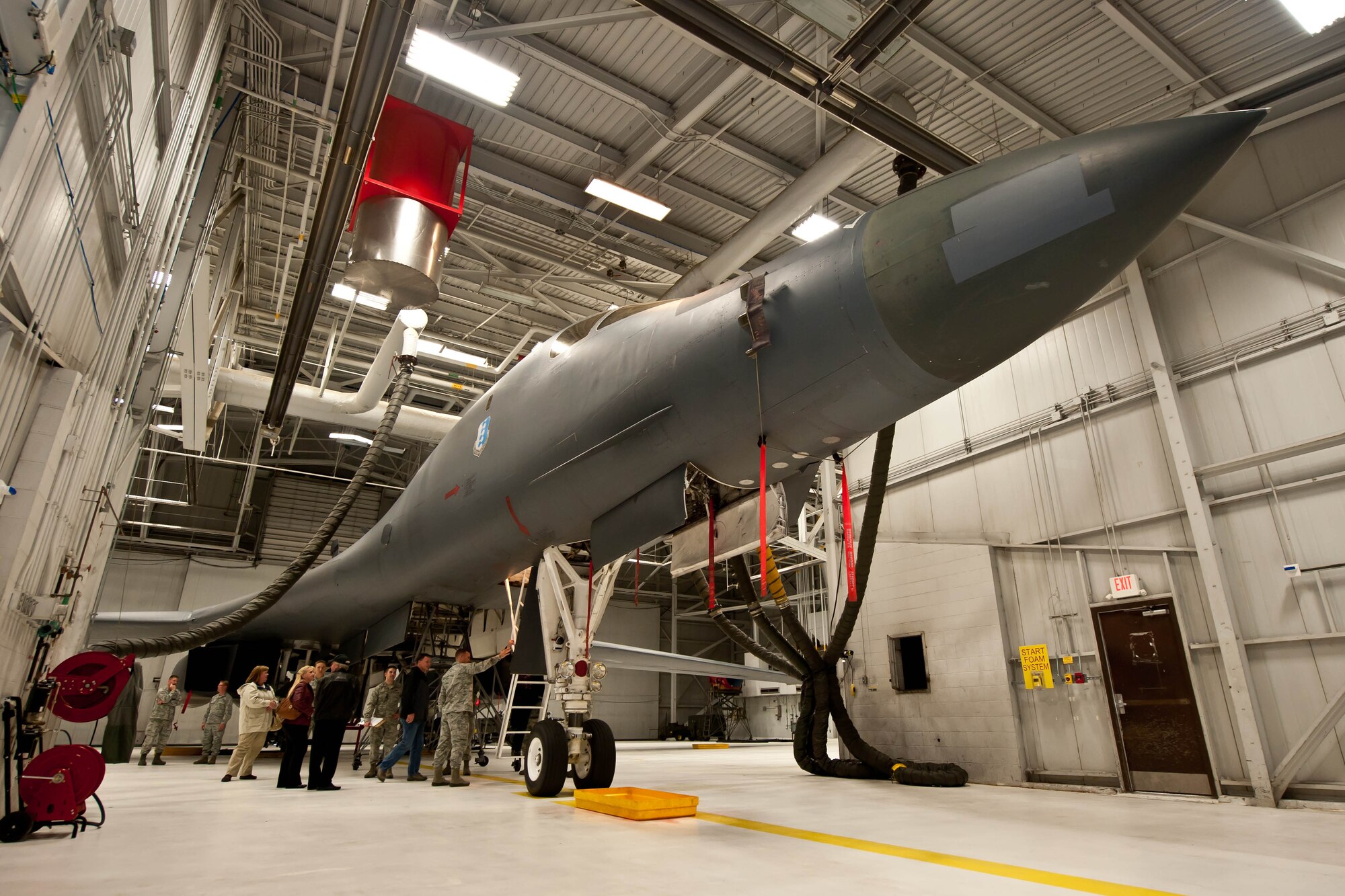 Airmen from the 28th Maintenance Squadron provide honorary commanders with a closer look of a B-1 bomber during a tour at Ellsworth Air Force Base, S.D., Oct. 19, 2012. The tour was designed to provide new 28th MXG honorary commanders with a better, broader understanding of the group’s mission. (U.S. Air Force photo by Airman 1st Class Zachary Hada/Released)