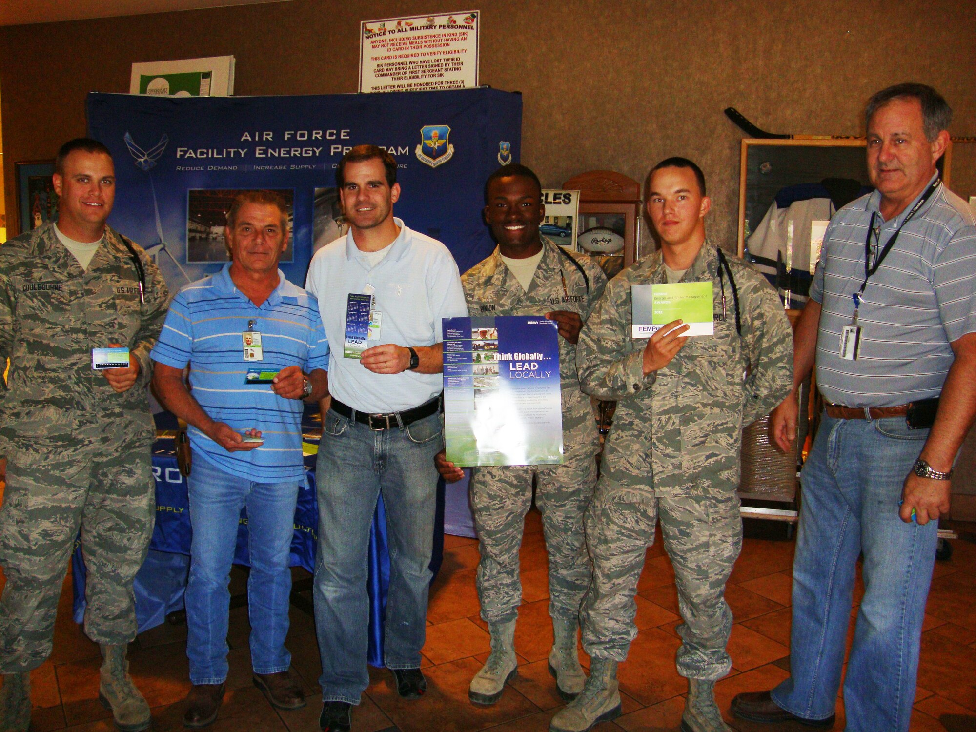 Members of the Sheppard Air Force Base Energy Team visited base dining facilities Oct. 19, 2012, to promote Energy Action Month by handing posters and flyers.  From left to right: Airman 1st Class Justin Coulbourne, Mike Gaffney (Primary Energy Construction Inspector), Eddie Jordan (Base Energy Manager), Airman Kevin Binion, Airman Jarred Howell, Paul Woods (Resource Efficiency Manager). (U.S. Air Force courtesy photo)