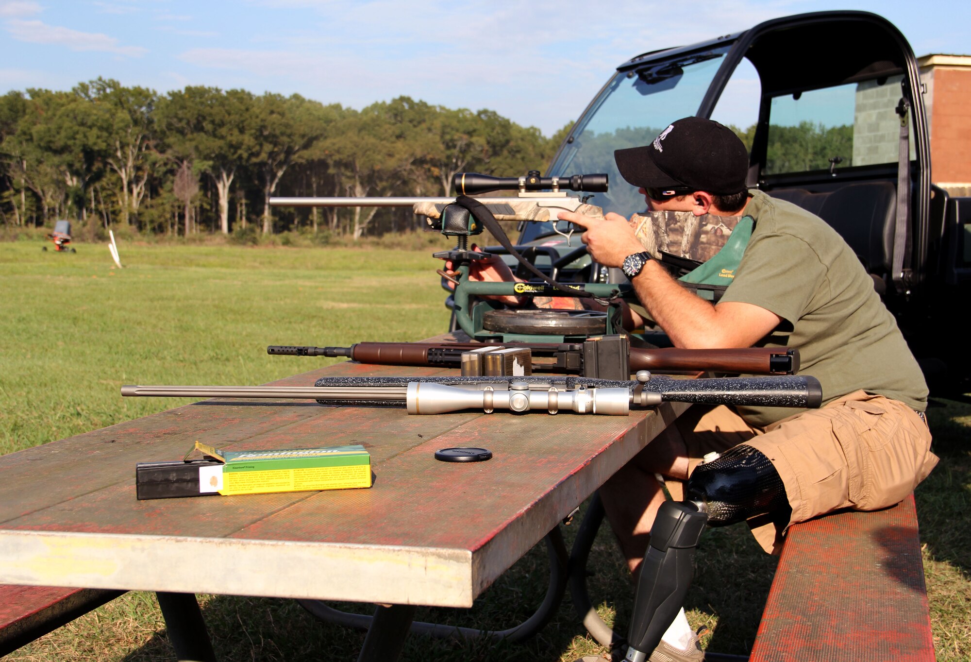 Kiel Vickers, wounded warrior, checks his rifle for accuracy on Barksdale's East Reservation during the first ever Wounded Warrior Hunt on Barksdale Air Force Base, La., Oct. 14. The event took place Oct. 12-15, and provided the attendees a chance to unwind from the pressures of doctors, hospitals and appointments. (Courtesy photo)

