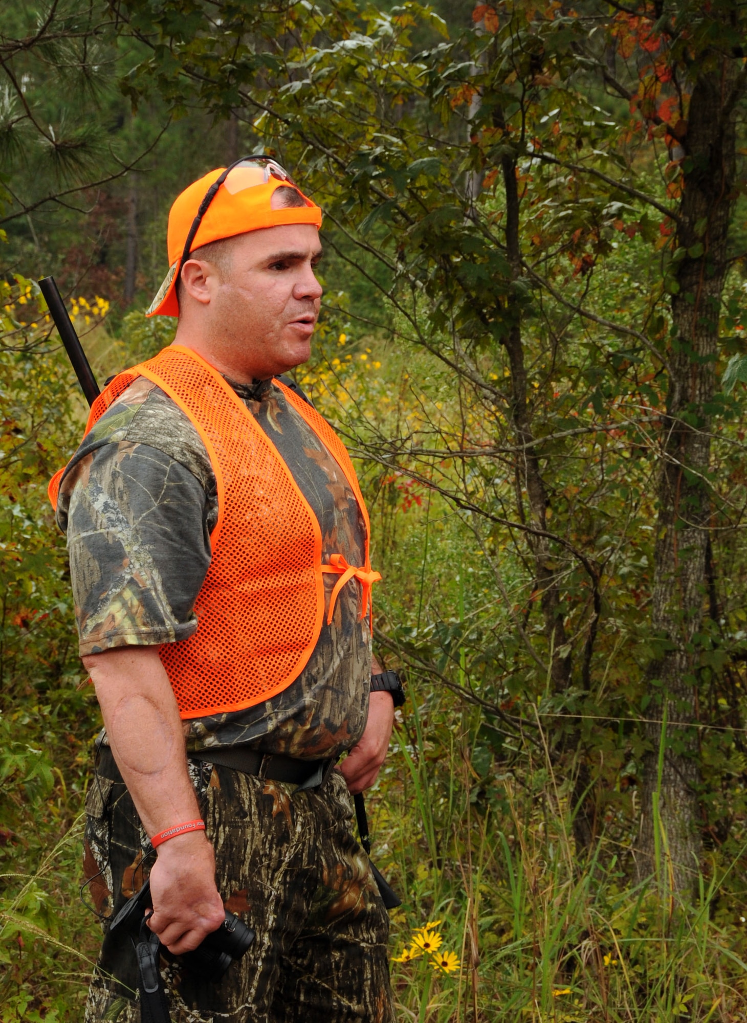 Tech. Sgt. Reese Hines, wounded warrior, stands in the scrubs on Barksdale's East Reservation during the first ever Wounded Warrior Hunt on Barksdale Air Force Base, La., Oct. 13. Barksdale hosted six wounded service members for a weekend of hunting, camaraderie and rehabilitation. This was Hines first deer hunt. (U.S. Air Force photo/Staff Sgt. La'Shanette V. Garrett)(RELEASED)