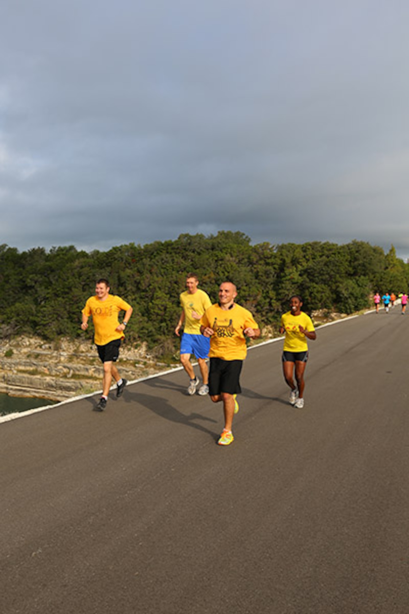 (From left to right), Peter Springirth, Shane Meling, Andrew Armstrong, and Latoya Siples, members of the 433rd Logistics Readiness Squadron Team, compete with 36 other teams during a 6-mile run Oct. 20 at the Joint Base San Antonio Recreation Park at Canyon Lake.   The annual event promotes physical fitness and morale. 



