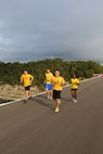 (From left to right), Peter Springirth, Shane Meling, Andrew Armstrong, and Latoya Siples, members of the 433rd Logistics Readiness Squadron Team, compete with 36 other teams during a 6-mile run Oct. 20 at the Joint Base San Antonio Recreation Park at Canyon Lake.   The annual event promotes physical fitness and morale. 



