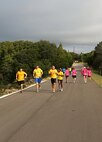 (From left to right), Peter Springirth, Shane Meling, Andrew Armstrong, and Latoya Siples, members of the 433rd Logistics Readiness Squadron Team, compete with 36 other teams during a 6-mile run Oct. 20 at the Joint Base San Antonio Recreation Park at Canyon Lake.  The annual event promotes physical fitness and morale. 


