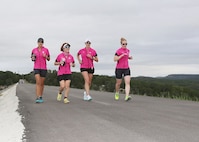 Team Road Diva members (from left to right), Carolina Marin Soto, Kimberly Felty, Jennifer Mitchell, and Johanna House, compete with 36 other teams during a 6-mile run Oct. 20 at the Joint Base San Antonio Recreation Park at Canyon Lake.  The annual event promotes physical fitness and morale. 

