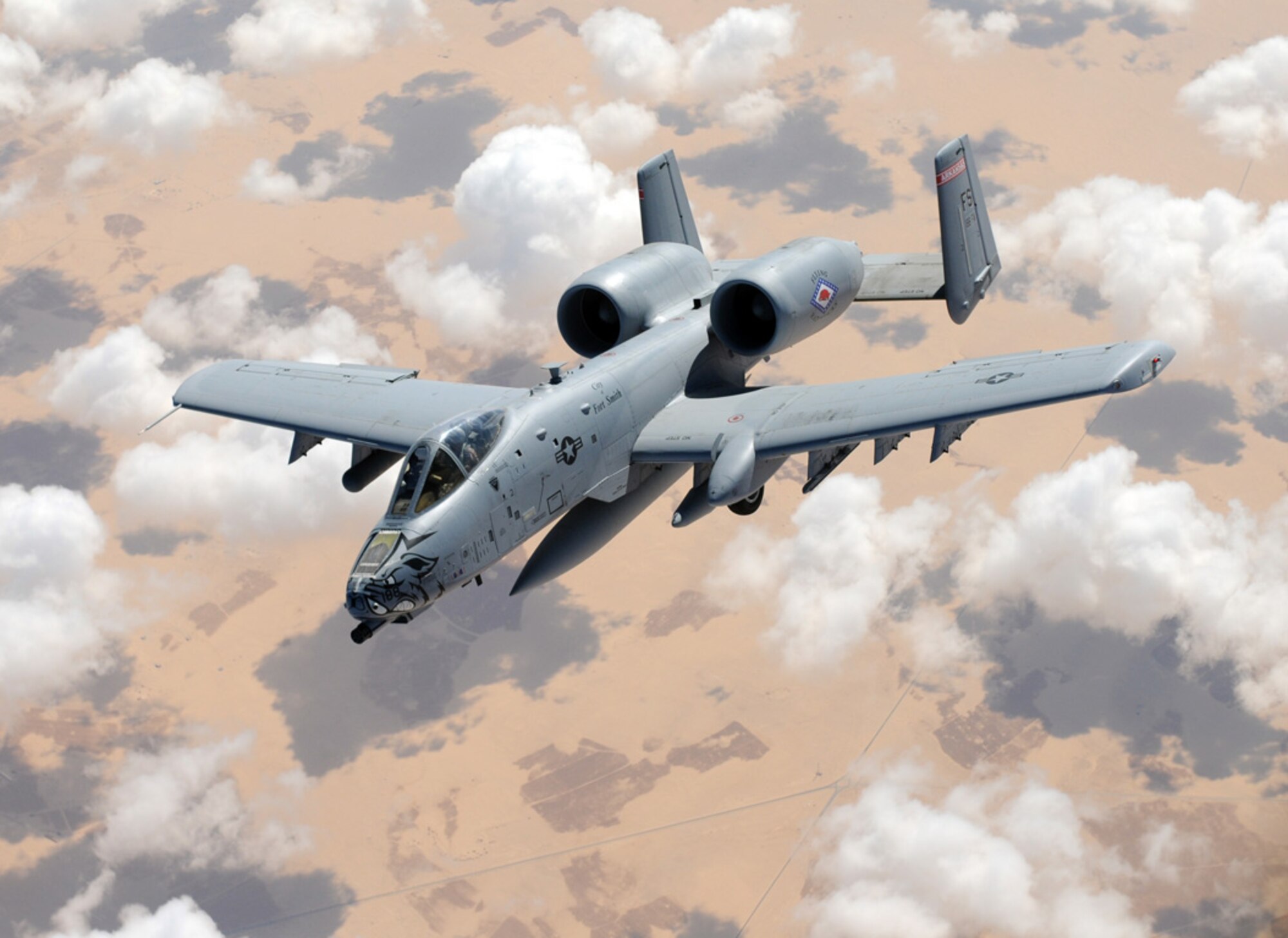 An A-10 Thunderbolt II from the 188th Fighter Wing, Arkansas Air National Guard, flies off the wing of a KC-135 Stratotanker assigned to the 100th Air Refueling Wing, RAF Mildenhall, England, during a coronet mission Oct. 12, 2012, over the skies of Egypt. A coronet is when an aerial refueling tanker escorts fighters over long distances, regularly topping off their fuel tanks along the way. The 188th A-10 and its pilot were returning to Fort Smith, Ark., from a deployment to Bagram Airfield, Afghanistan in support of Operation Enduring Freedom. (U.S. Air Force photo by Staff Sgt. Austin M. May)
