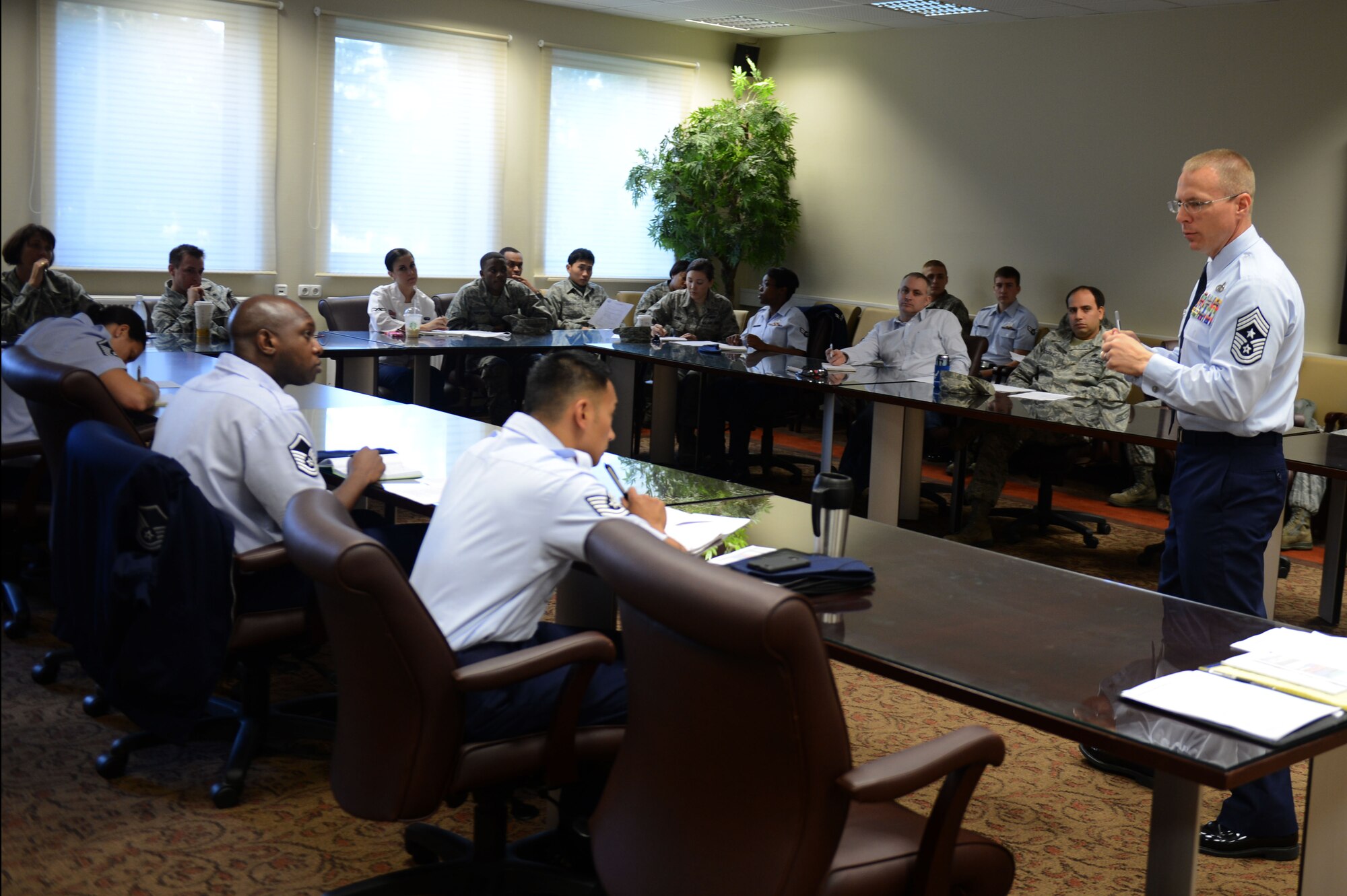 SPANGDAHLEM AIR BASE, Germany – U.S. Air Force Chief Master Sgt. Matthew Grengs, 52nd Fighter Wing command chief from Longmont, Colo., speaks at a Spangdahlem Dormitory Executive Advisory Counsel meeting at the welcome center Oct. 22, 2012. (U.S. Air Force photo by Airman 1st Class Gustavo Castillo/Released) 