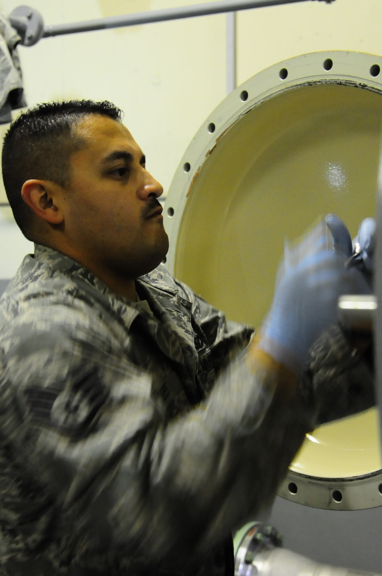 Staff Sgt. Luis Lepe, 786th Civil Engineer Squadron liquid fuels craftsman, changes fuel filters on Ramstein Air Base, Germany, Oct. 17, 2012. Changing filters often helps ensure fuel gets cleaned properly. (U.S. Air Force photo/ Airman 1st Class Hailey Haux)