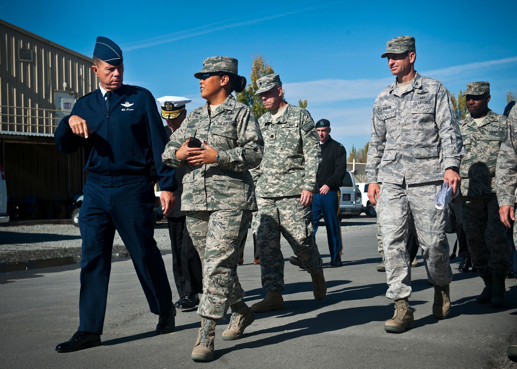 Col. Shirlene Ostrov, 376th Expeditionary Mission Support Group commander, provides a tour to Gen. William M. Fraser III (left), U.S. Transportation Command commander, at the Transit Center at Manas, Kyrgyzstan, Oct. 23, 2012. Fraser visited with deployed service members and saw day-to-day operations conducted at the Transit Center. (U.S. Air Force photo/Senior Airman Brett Clashman)