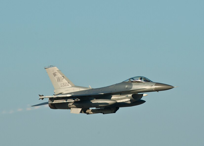 An F-16 Fighting Falcon with the 8th Fighter Wing flies during exercise Beverly Midnight 13-1 at Kunsan Air Base, Republic of Korea, Oct. 18, 2012. This was part of the first set of flights for BM 13-1 and tests the capabilities of ground and air crew during a wartime scenario. (U.S. Air Force photo/Staff Sgt. Jonathan Fowler)