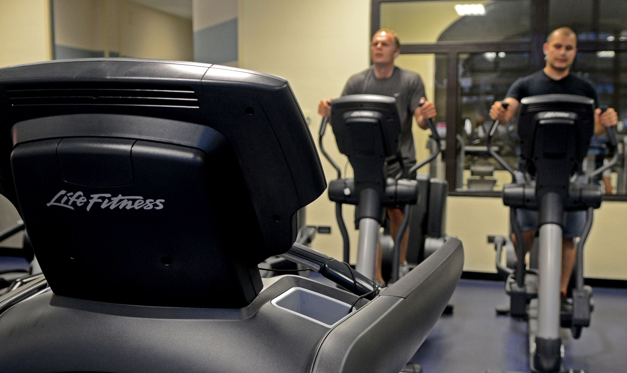 Aviano Airmen use new cardio equipment at the Dragon Fitness Center Oct. 4 at Aviano Air Base, Italy. Both the Falcon and Dragon Fitness Centers recently made significant improvements to their facilities, including new cardio equipment, televisions and DVD players. (U.S. Air Force photo/Airman 1st Class Jenay Randolph)