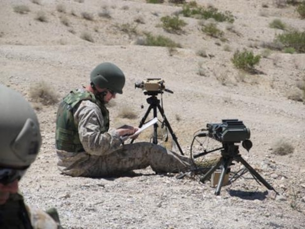 Expeditionary Warfare Training Group, Pacific (EWTGPAC) Tactical Air Control Party Fire Exercise (TACP FIREX). This image shows a Joint Terminal Attack Controller student preparing for his next laser designation mission using the Elbit AN/PEQ-19 Joint Terminal Attack Controller Laser Target Designator (JTAC LTD) in response to an Urgent Universal Need Statement (UUNS) .
