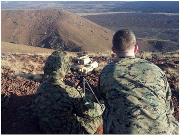 Marines conduct training in the Joint Tactical Air Controller- Laser Target Designator (JTAC-LTD) and the Thermal Laser Spot Imager (TLSI) in the Pohakuloa Training Area on the Big Island of Hawaii.
