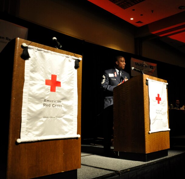 Chief Master Sgt. Arthur Green, 36th Aerial Port Squadron superintendent out of McChord Field, Wash., gives his thanks at the Red Cross 2012 Heroes’ Breakfast, Oct. 24 at the Hotel Murano, Tacoma, Wash. Senior Airman Andrew Moser and Airman 1st Class Micah Myers, also with the 36th APS, received the Good Samaritan Award for their valiant actions in saving a Lakewood, Wash. man’s life, June 2 during the Reserve drill weekend. Green accepted the award on the absent Myer’s behalf. (U.S. Air Force photo by Master Sgt. Jake Chappelle)