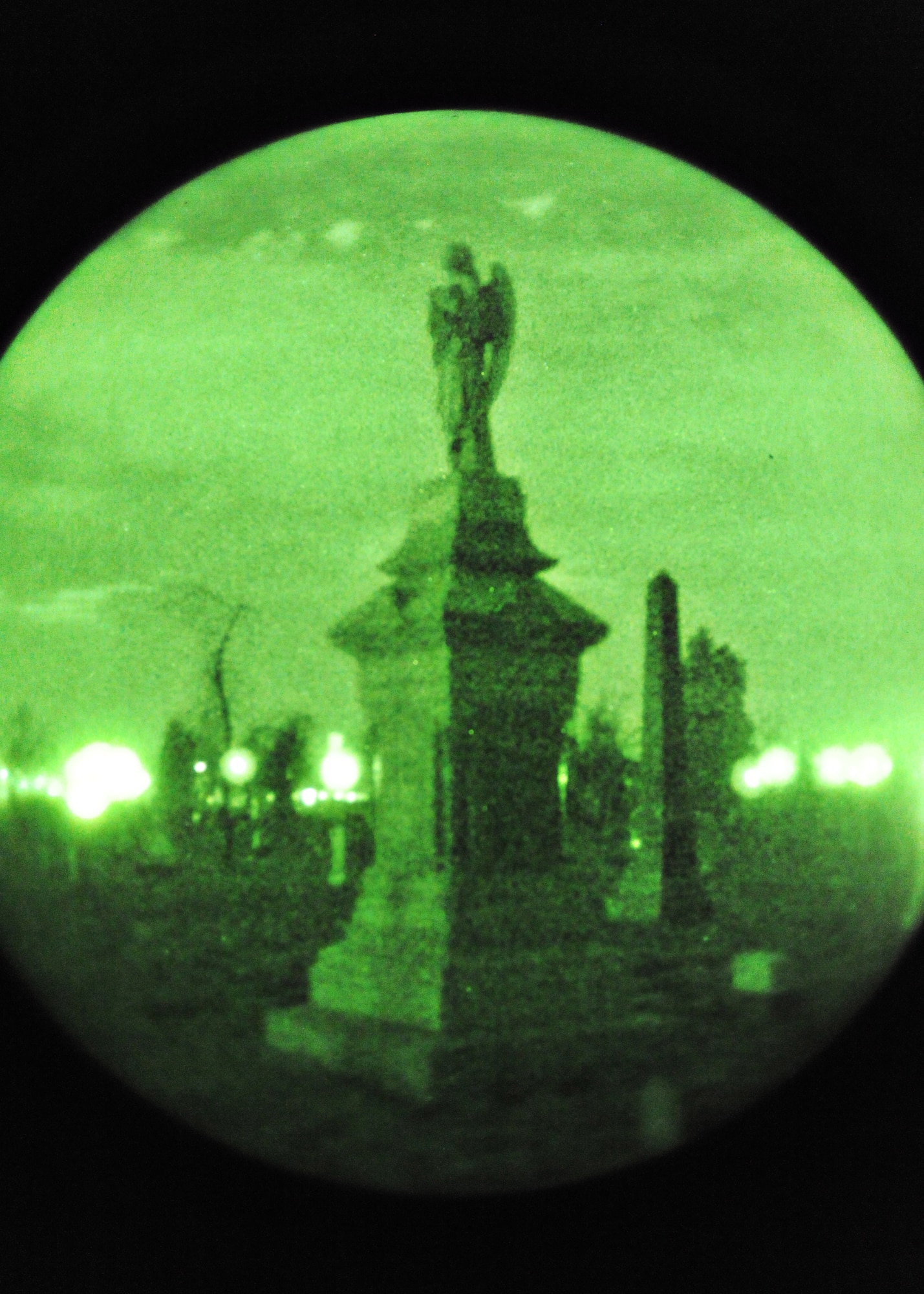 Denver – An angel statue stares into the night Oct 13, 2012, at the Riverside Cemetery.The Riverside Cemetery Moonlight Mystery & History Tour takes place at night in the locked cemetery. (U.S. Air Force photo by Senior Airman Marcy Glass) 