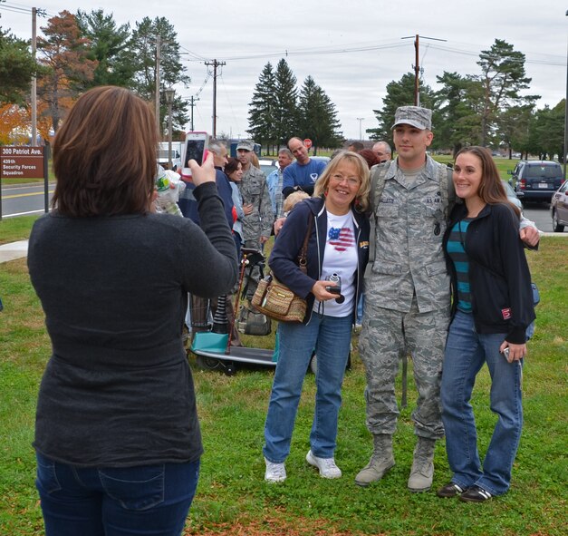 Members of the 439th Security Forces Squadron arrived at Westover Air Reserve Base Thursday morning following a six-month deployment to Southwest Asia. About 20 deployed reservists reunited with their families at the Security Forces Squadron building. (U.S. Air Force photo by SrA Kelly Galloway)