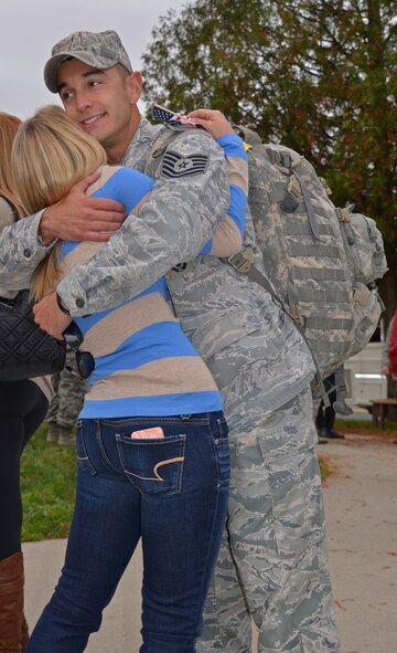 Members of the 439th Security Forces Squadron arrived at Westover Air Reserve Base Thursday morning following a six-month deployment to Southwest Asia. About 20 deployed reservists reunited with their families at the Security Forces Squadron building. (U.S. Air Force photo by SrA Kelly Galloway)