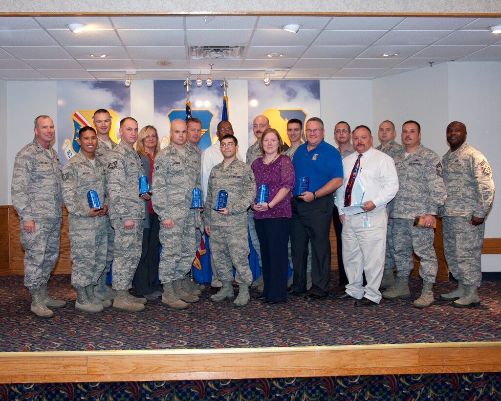 Brig. Gen. Michael Fantini (far left), 82nd Training Wing commander, and Chief Master Sgt.Eric Johnson (far right), 82nd TRW command chief, congratulate wing quarterly award winners Oct. 25, 2012, at Sheppard Air Force Base, Texas. The wing recognized its winners with a luncheon at the Sheppard Club. (U.S. Air Force photo/Danny Webb)