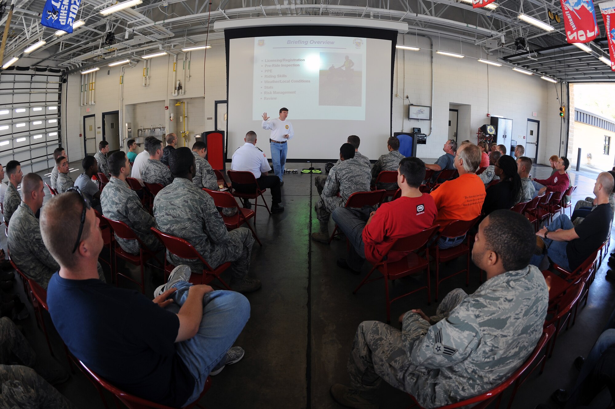 Sean Quinby, 4th Civil Engineer Squadron fire emergency services flight chief, conducts a motorcycle safety briefing at the base fire department on Seymour Johnson Air Force Base, N.C., Oct. 19, 2012. Topics discussed consisted of personal protective gear, riding techniques and regulations. (U.S. Air Force photo/Airman 1st Class John Nieves Camacho/Released)