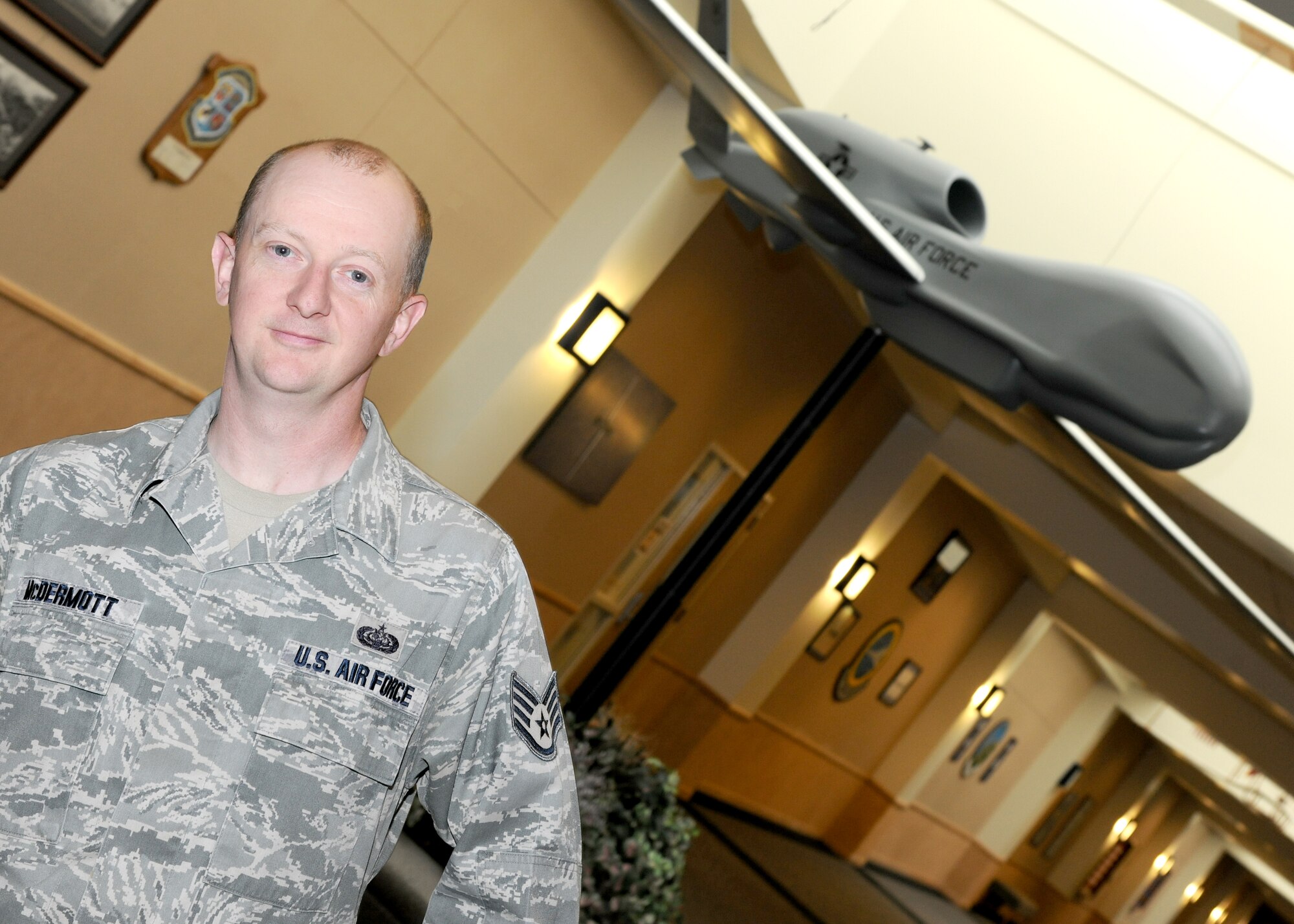 Staff Sgt. Ian McDermott, 69th Maintenance Squadron radio frequency transmission systems technician, pauses for a photo Oct. 25., 2012, on Grand Forks Air Force Base, N. D. McDermott said his most proud accomplishment here is helping to stand up the Global Hawk mission. (U.S. Air Force photo/Airman 1st Class Ashley N. Taylor)