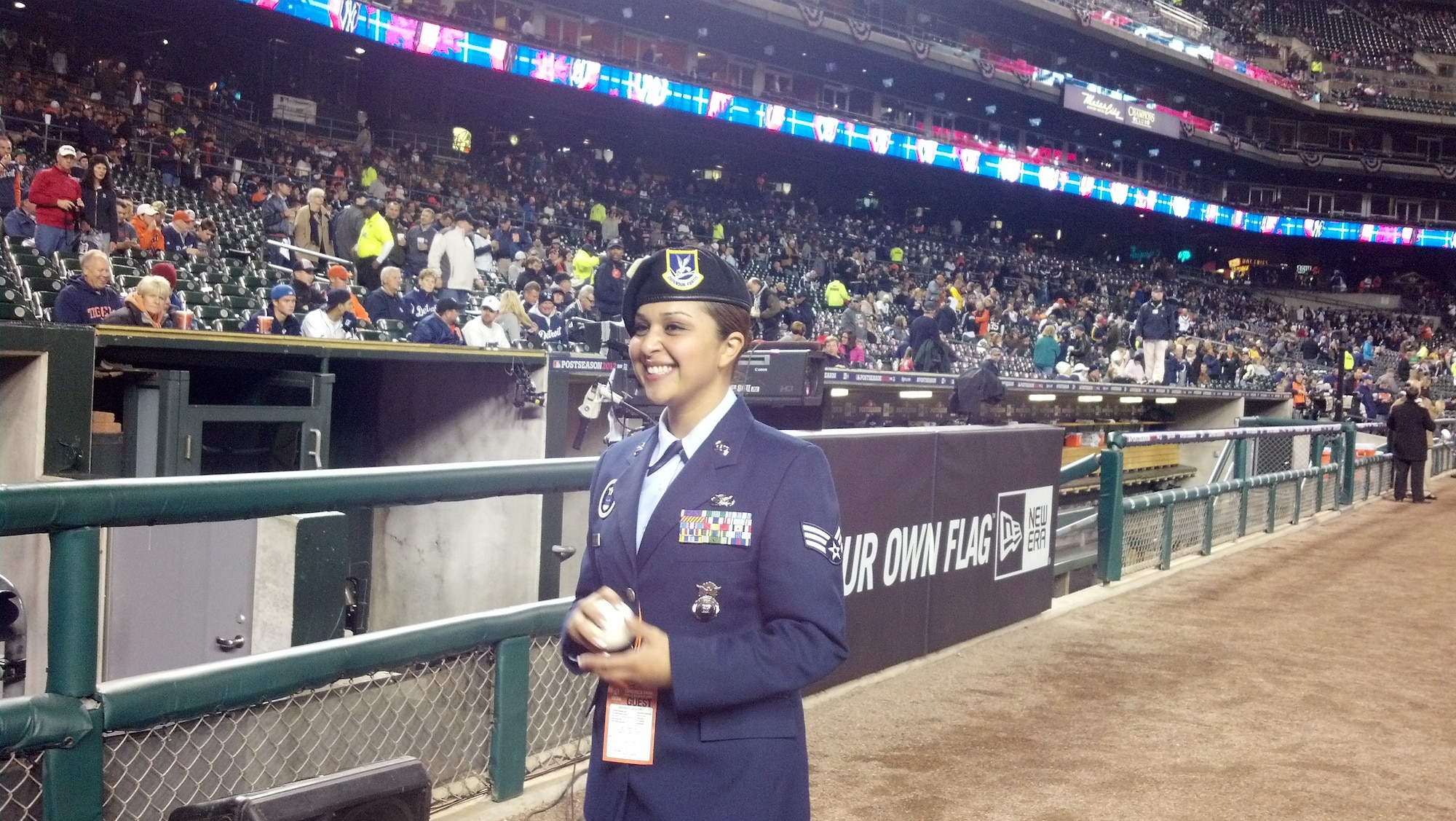 Senior Airman Jannette G. Meireles, Air Force recruiter for 339th Recruiting Squadron, talks with the crowd and members of the media prior to the start of Game 4 of the American League Championship Series.  The Detroit Tigers gave Merieles the public honor of delivering the game ball to the pitching mound in recognition for her dedication to the Air Force. (U.S. Air Force photo/Master Sgt. Zachariah R. Wireman)