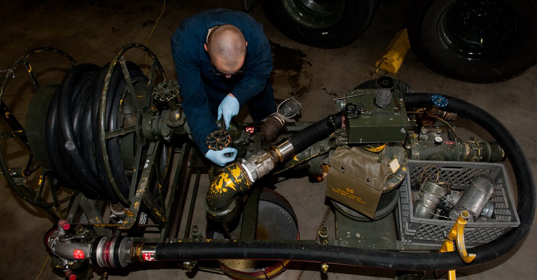 Staff Sgt. Joshua Baldwin, 28th Logistics Readiness Squadron refueling maintenance mechanic, repairs a gate valve during scheduled maintenance on a master meter in the fuels shop at Ellsworth Air Force Base, S.D., Oct. 16, 2012. Refueling maintenance Airmen are responsible for maintaining 13 vehicles used to refuel aircraft. (U.S. Air Force photo by Airman 1st Class Kate Thornton-Maurer/Released)