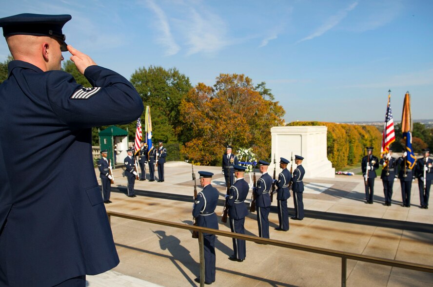 Service members salute during a wreath-laying ceremony Oct. 23 at the Tomb of the Unknowns, Arlington National Cemetery, Va. The air chiefs are attending the Air Force-hosted 2012 NATO Air Chiefs Conference in Washington, D.C. (U.S. Air Force photo by Senior Airman Tabitha N. Haynes)