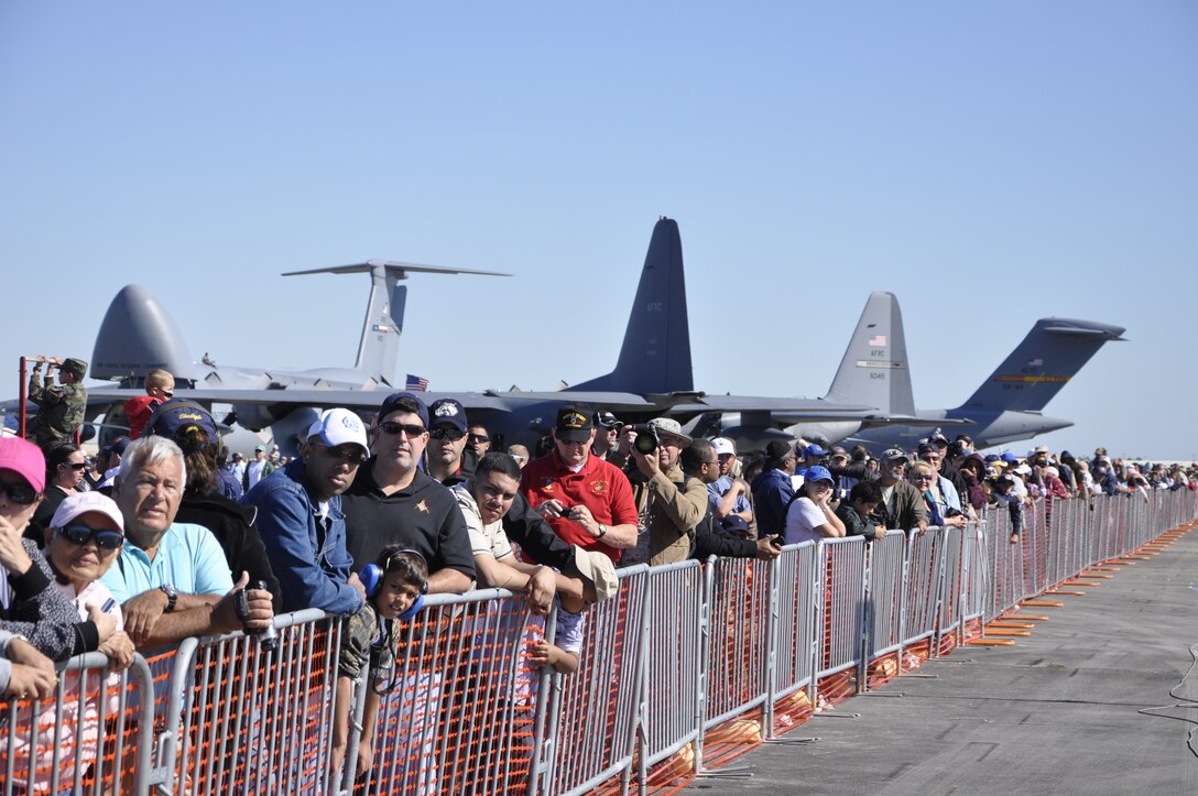 Spectators enjoy the 2010 Wings Over Homestead air show at Homestead Air Reserve Base. As the Wings Over Homestead air show, Nov. 3 and 4, draws near, Airmen and members of Homestead Air Reserve Base are putting the finishing touches on the planning for the base’s most anticipated event. Roughly 500,000 spectators are expected to attend this year's air show which features the Thunderbirds, the U.S. Air Force’s premier aerial demonstration team. (U.S. Air Force photo)