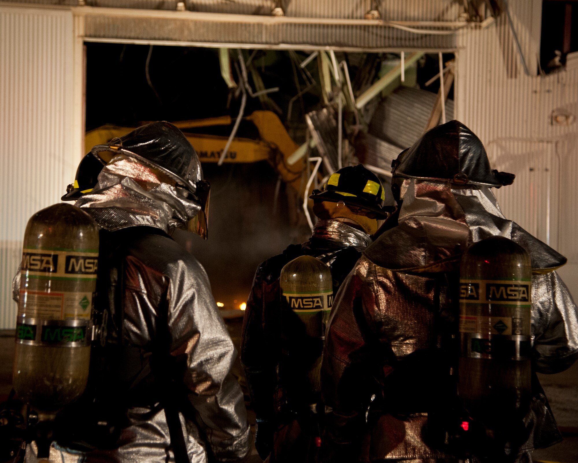 ALTUS AIR FORCE BASE, Okla. -- Firefighters from the 97th Civil Engineer Squadron fire department respond to a fire at a vacant building on base Oct. 24, 2012. The cause of the fire is unknown at this time. The fire took approximately two hours to put out. (U.S. Air Force photo by Senior Airman Kenneth W. Norman / Released)