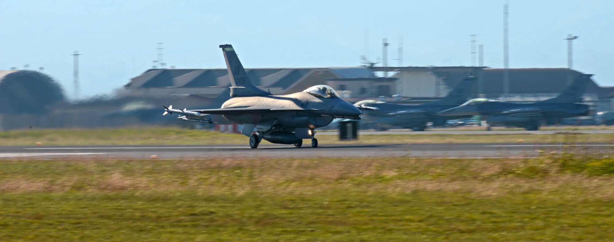 Capt. Joshua Rasmussen, 555th Fighter Squadron pilot, begins his take off in an F-16 Fighting Falcon at Aviano Air Base, Italy, Oct. 24.  The F-16 Fighting Falcon is a compact, multi-role fighter aircraft. It is highly maneuverable and has proven itself in air-to-air combat and air-to-surface attack. (U.S. Air Force photo/Airman 1st Class Matthew Lotz)