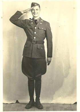 U.S. Army Pfc. Clyde Sparks salutes in this photo taken around 1944. Sparks served in Luxembourg during the Battle of the Bulge. (Courtesy photo)